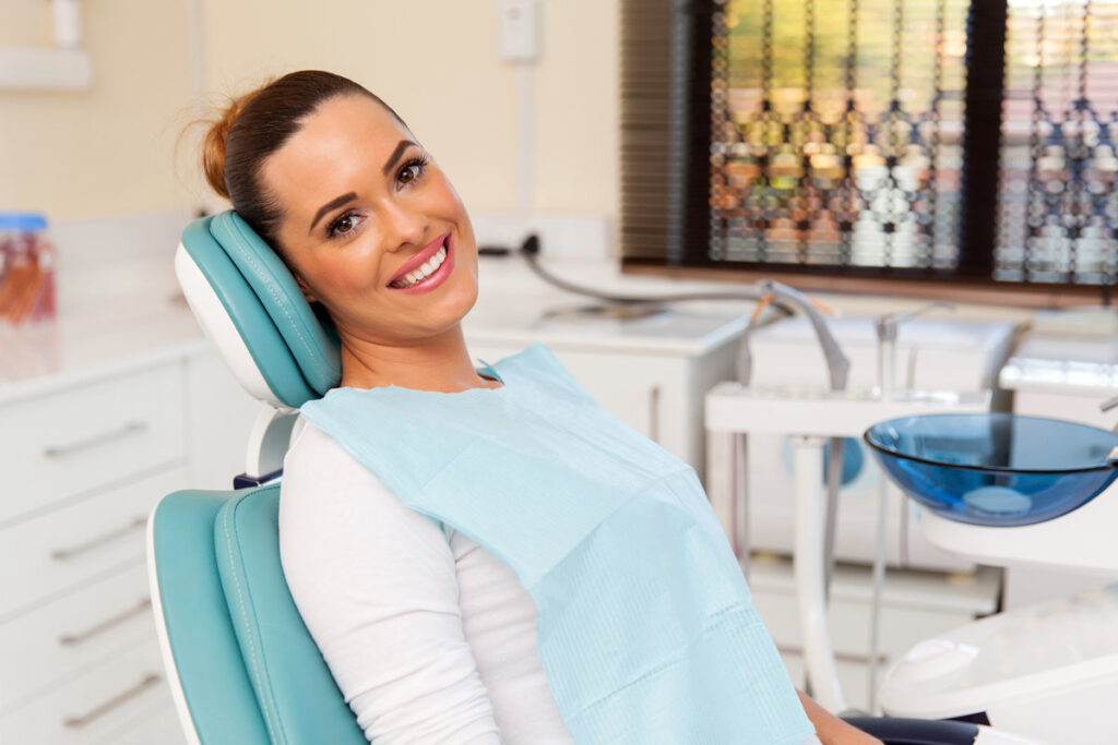 beautiful female patient in dental practice